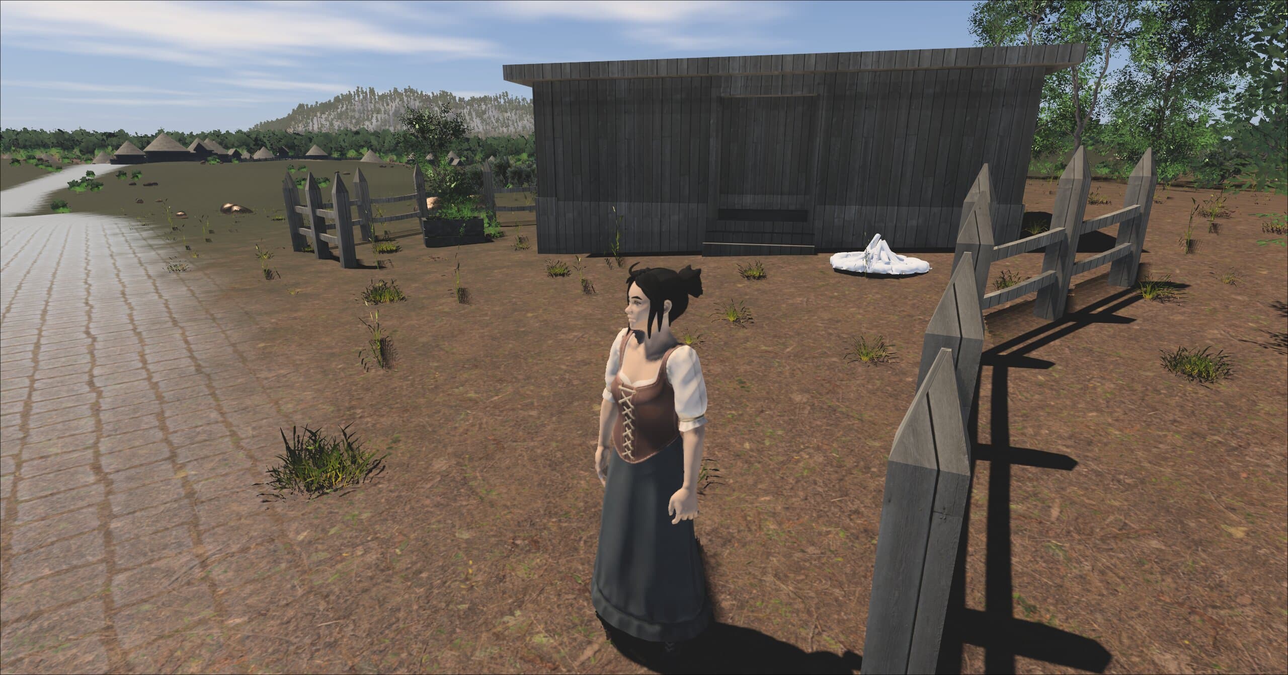 A player standing before the Emporium, a single dark wooden building behind a split-rail fence beside a cobbled road